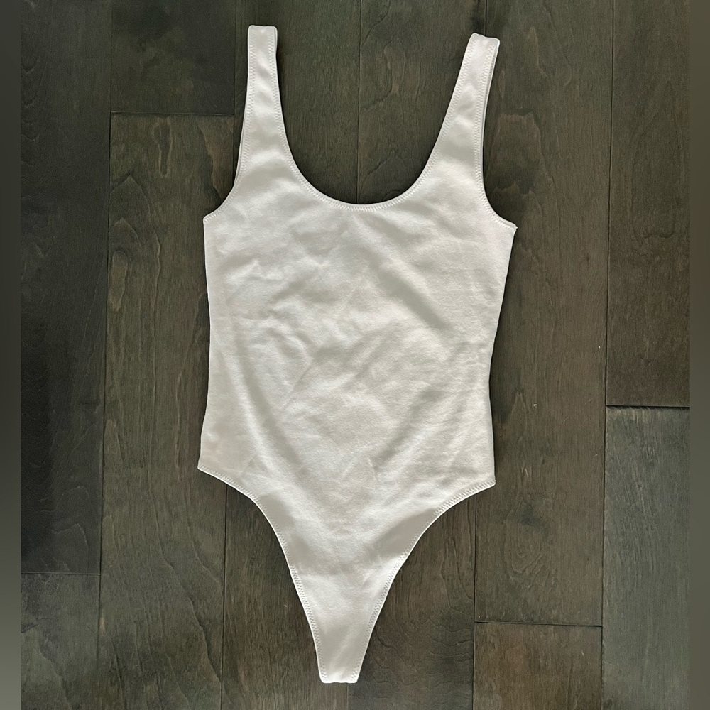 Aritzia Neutral Pink Body Suit